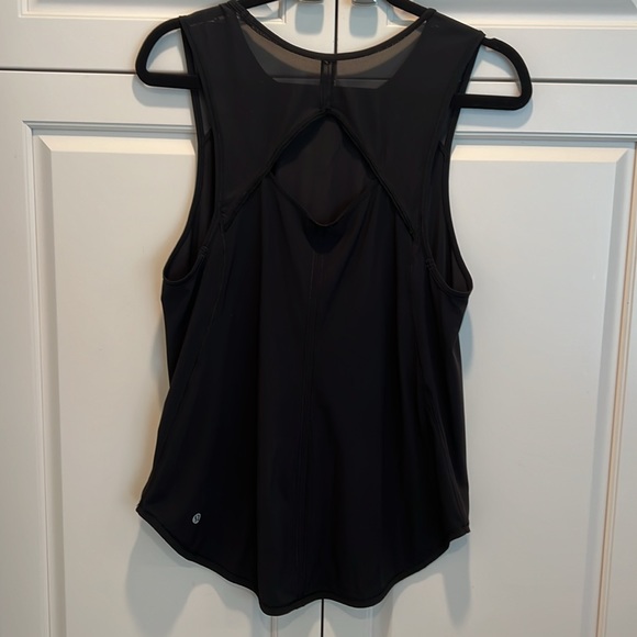Lululemon black size 12 mesh Back keyhole loosefitting top. Very good shape. 👍 - Picture 3 of 10